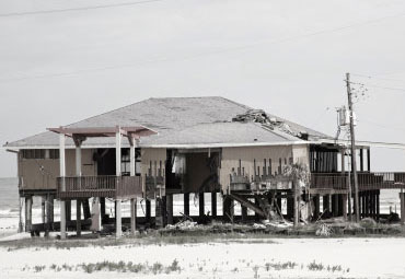Wind damage - spray foam can help prevent uplift to Dallas roofs